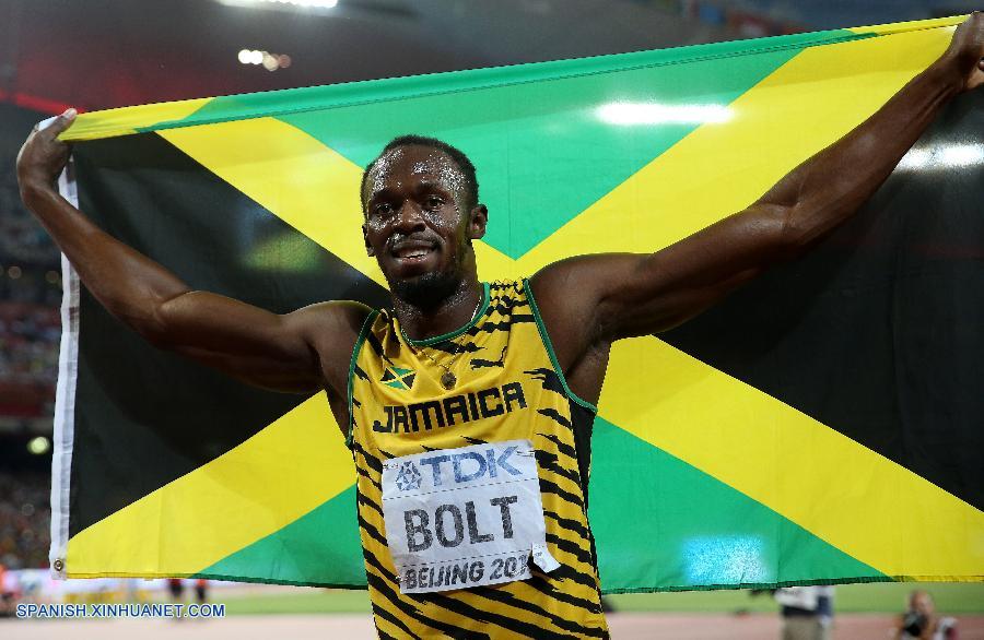 Usain Bolt de Jamaica ganó hoy en Beijing su cuarta medalla de oro consecutiva en 200 metros, un récord, y su décimo oro en campeonatos mundiales.