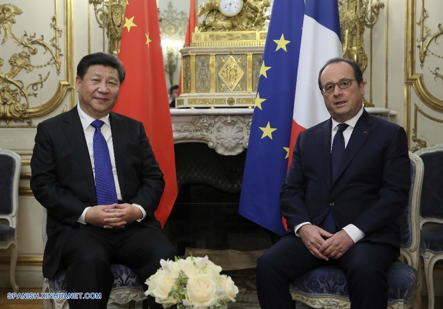 El presidente chino, Xi Jinping, se reunió este domingo en París con su homólogo francés, Francois Hollande, antes de la conferencia clave de la ONU sobre el cambio climático, y prometió trabajar juntos para hacer que la cumbre resulte exitosa.