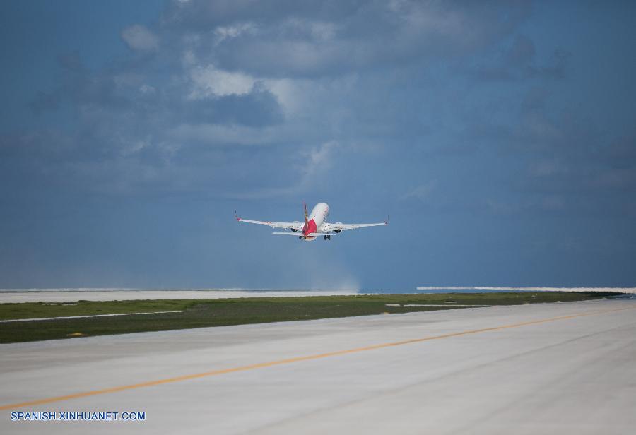 China realizó con éxito hoy miércoles vuelos de prueba en un aeródromo recién construido en el mar Meridional de China.