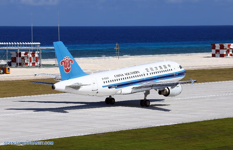 China realizó con éxito hoy miércoles vuelos de prueba en un aeródromo recién construido en el mar Meridional de China.