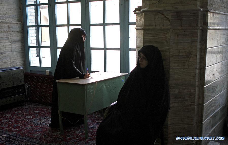 IRAN-QOM-ELECTION-VOTING