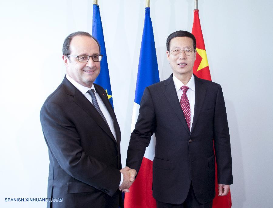 El vice primer ministro de China Zhang Gaoli celebró el viernes encuentros por separado con el presidente francés, Francois Hollande, y el secretario de Estado norteamericano, John Kerry, abogando por la plena implementación del Acuerdo de París sobre el cambio climático.