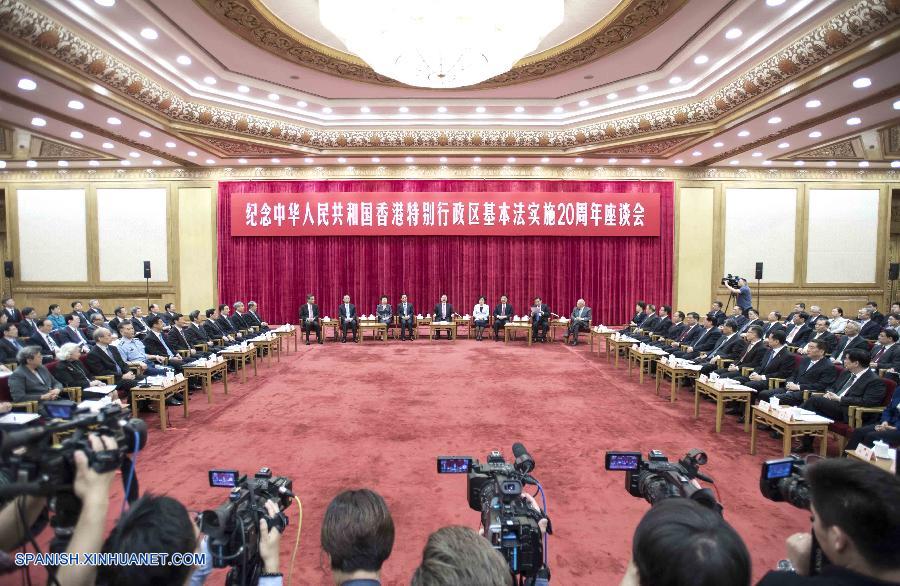 China celebró hoy un simposio de alto nivel para conmemorar el 20º aniversario de la implementación de la Ley Básica de la Región Administrativa Especial de Hong Kong (RAEHK).