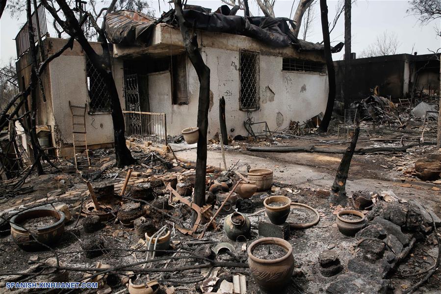 ISRAEL-MEVO MODI IM-INCENDIO-DAÑOS