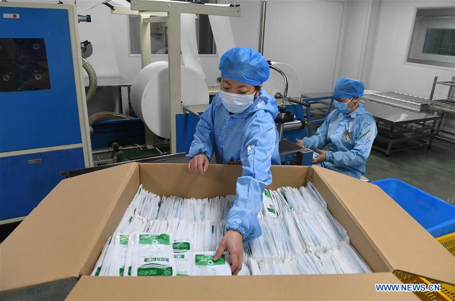 CHINA-GUANGXI-NANNING-NUEVO CORONAVIRUS-MASCARILLAS-PRODUCCION