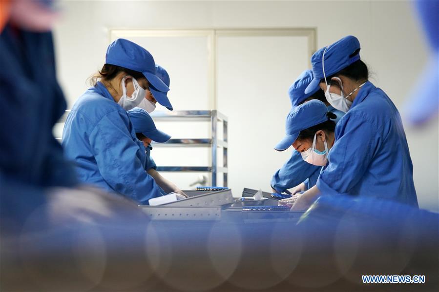 CHINA-HEILONGJIANG-HARBIN-REANUDACION DE LA PRODUCCION-SERIE