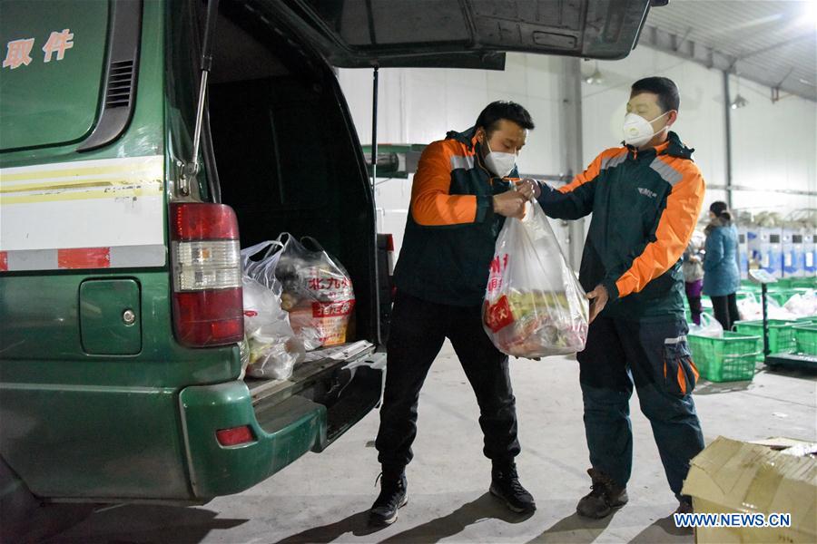 CHINA-XINJIANG-URUMQI-CORREOS DE CHINA-NUEVO CORONAVIRUS