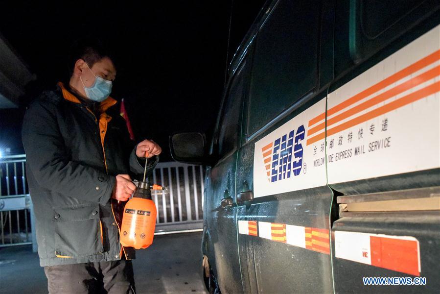 CHINA-XINJIANG-URUMQI-CORREOS DE CHINA-NUEVO CORONAVIRUS