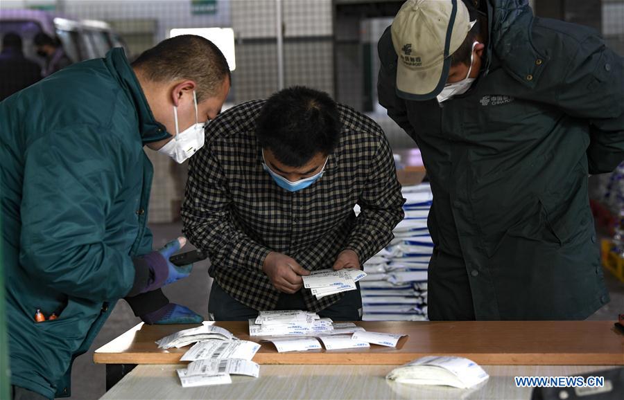 CHINA-NINGXIA-YINCHUAN-CORONAVIRUS-CORREO-LIBROS DE TEXTO