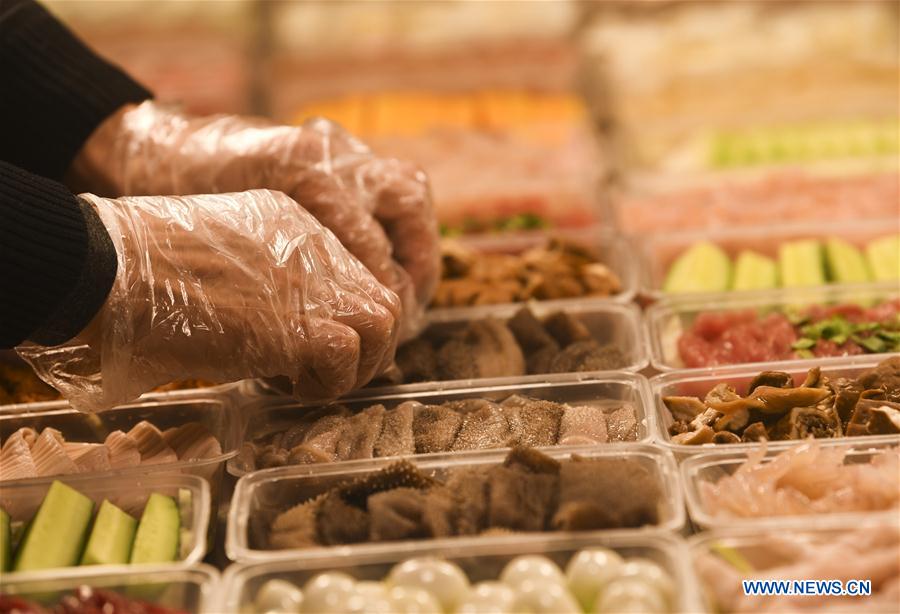 CHINA-CHONGQING-CORONAVIRUS-OLLA CALIENTE-PARA LLEVAR