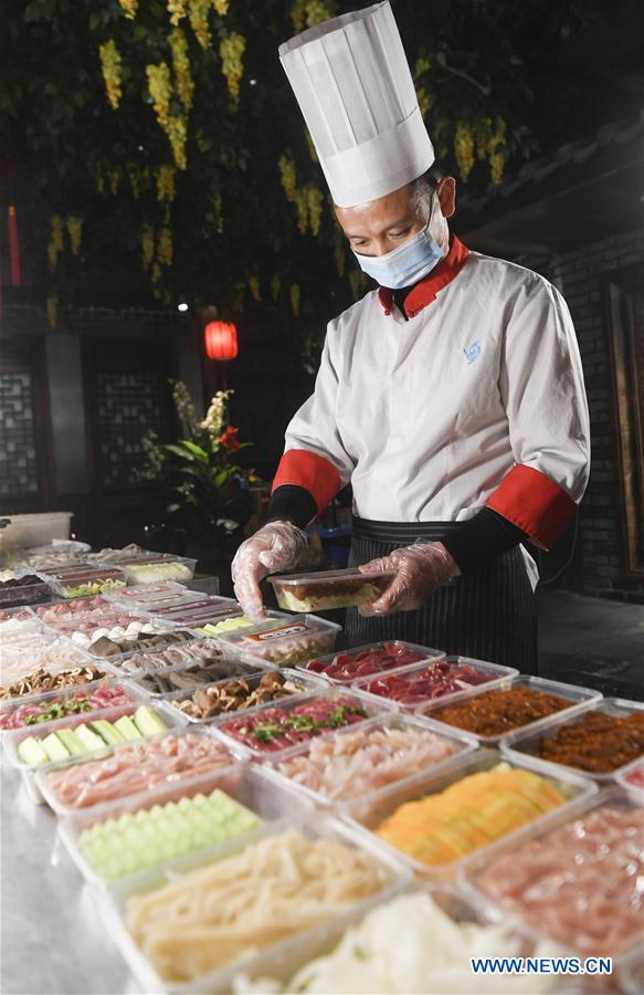 CHINA-CHONGQING-CORONAVIRUS-OLLA CALIENTE-PARA LLEVAR