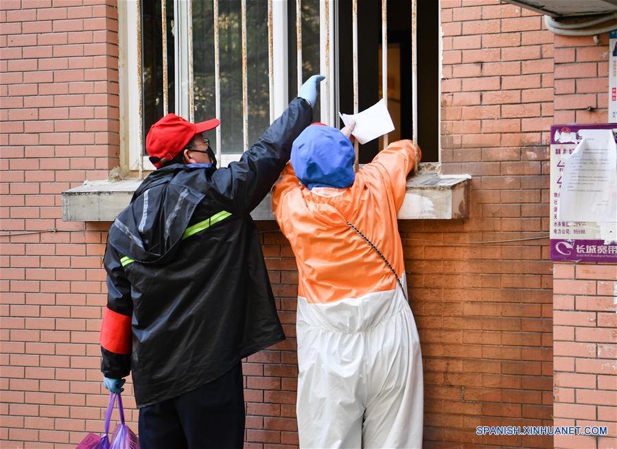 CHINA-WUHAN-COVID 19-VOLUNTARIOS