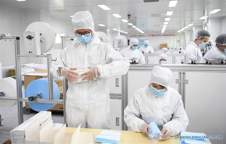 CHINA-GUANGZHOU-NUEVO CORONAVIRUS-GAC-PRODUCCION DE MASCARILLAS