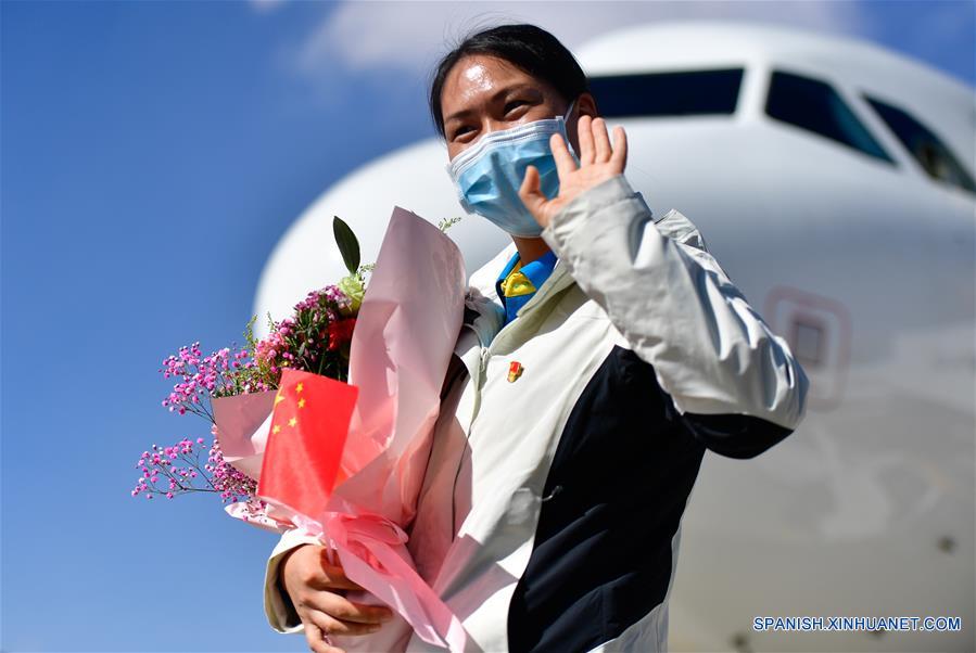 CHINA-QINGHAI-COVID-19-TRABAJADORES DE LA SALUD-REGRESO-LLEGADA