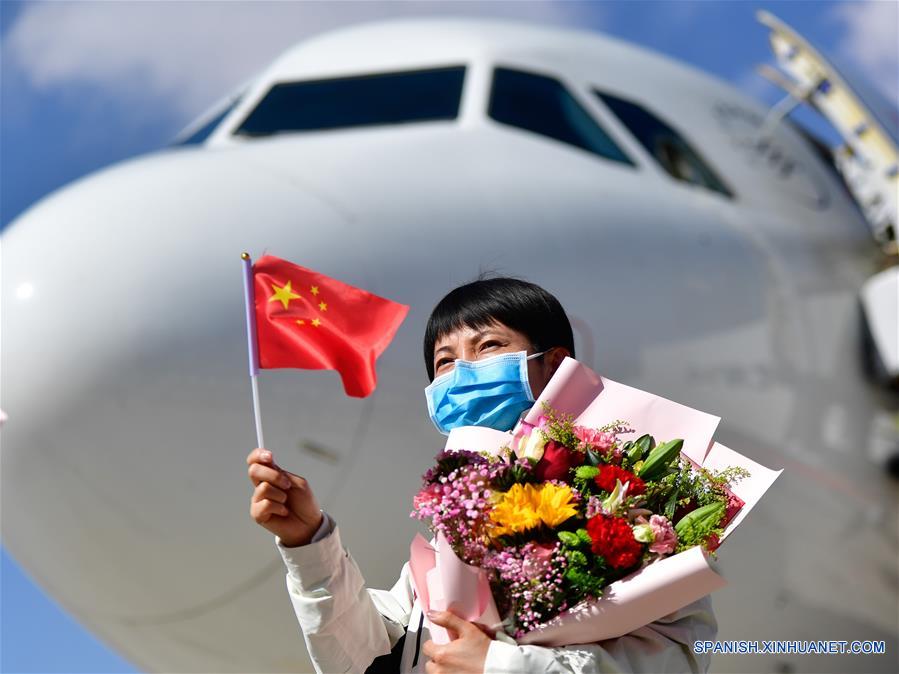 CHINA-QINGHAI-COVID-19-TRABAJADORES DE LA SALUD-REGRESO-LLEGADA