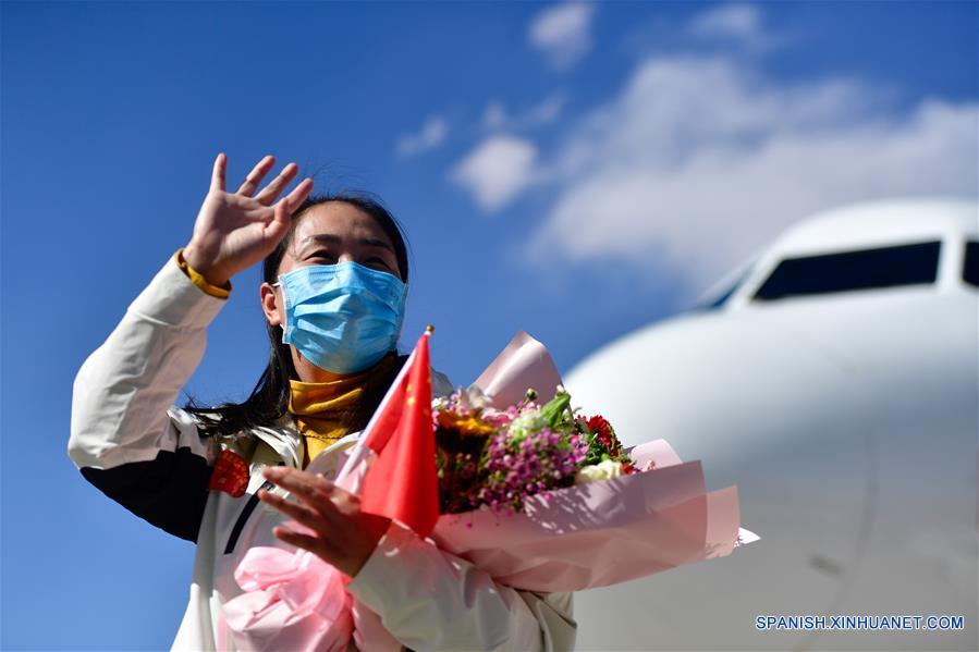 CHINA-QINGHAI-COVID-19-TRABAJADORES DE LA SALUD-REGRESO-LLEGADA