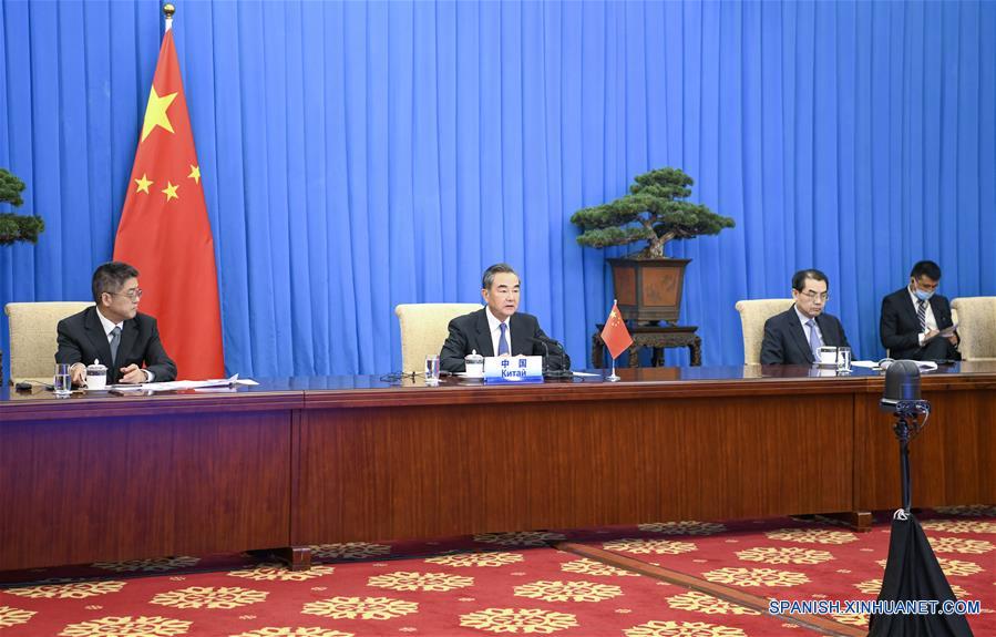 CHINA-BEIJING-WANG YI-VIDEO-REUNION