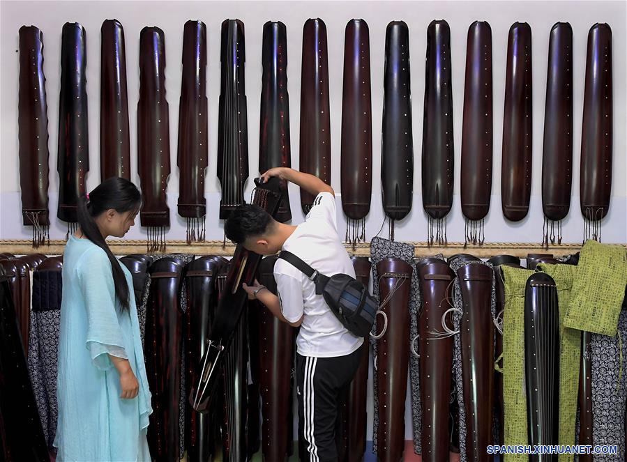 CHINA-HENAN-DESARROLLO-PRODUCCION DE INSTRUMENTOS MUSICALES