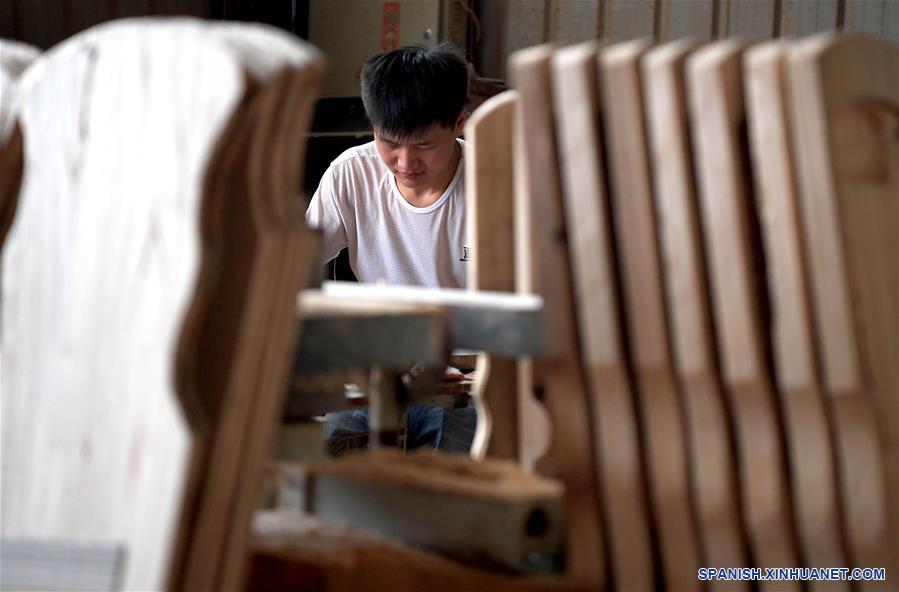 CHINA-HENAN-DESARROLLO-PRODUCCION DE INSTRUMENTOS MUSICALES