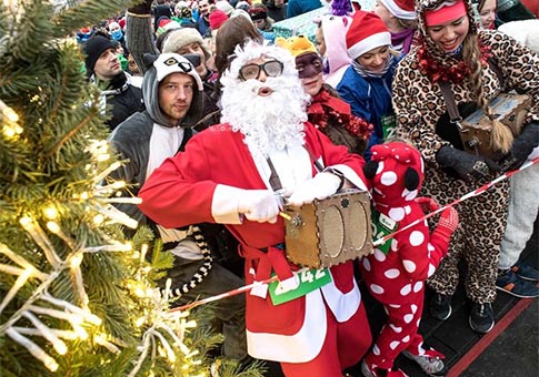 Celebran en el mundo la Carrera de Navidad
