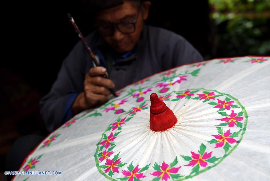 Sombrilla de papel aceite, una artesanía tradicional china
