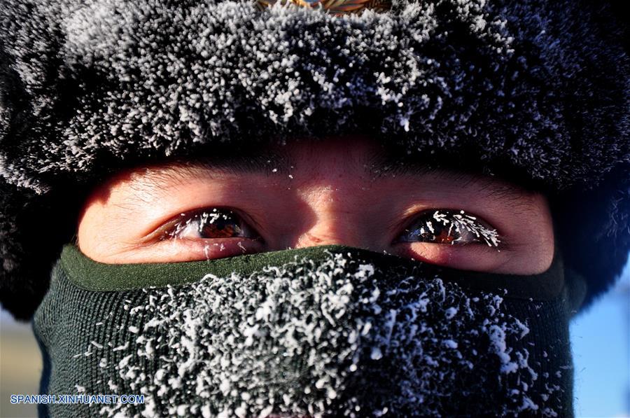 Fotos de Xinhua de la semana 1123-1129: China, cubierta de nieve