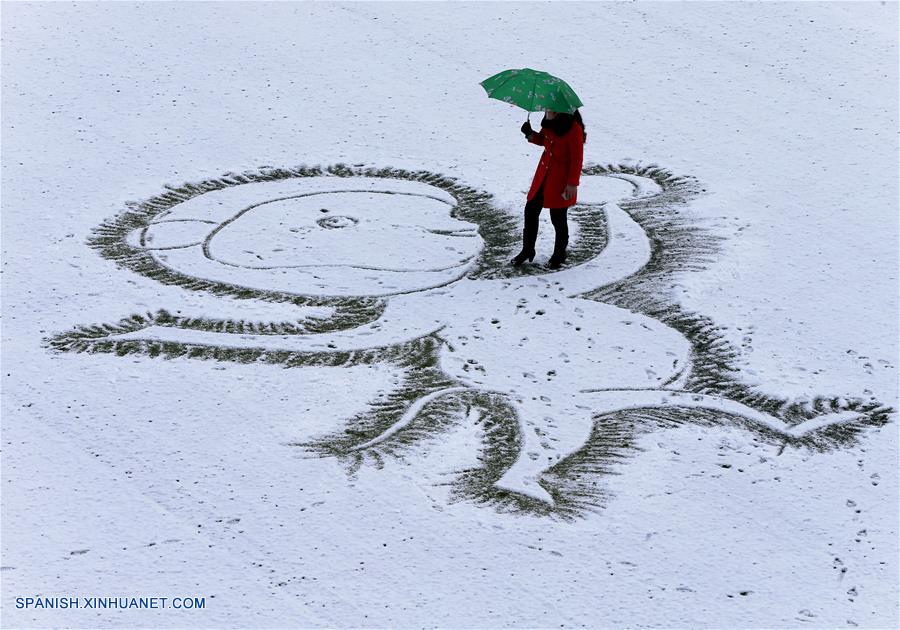 Fotos de Xinhua de la semana 0118-0124: China, Mundo de hielo y nieve