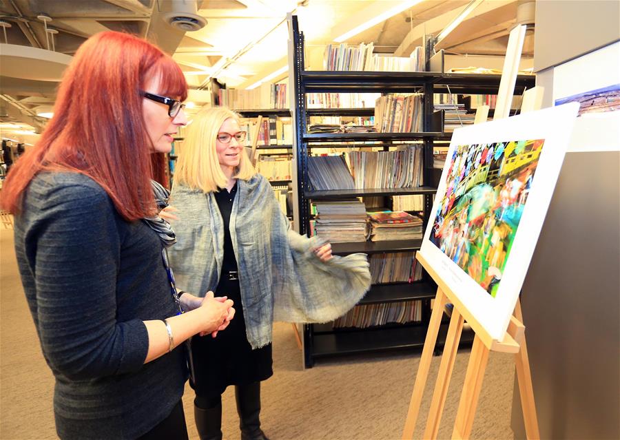 Se celebra la exhibición fotográfica Tempo of China en la Universidad de Toronto, Canadá, el 27 de enero de 2016, la cualexhibe 60 obras seleccionadas de trabajos presentados por más de mil fotógrafos de China.