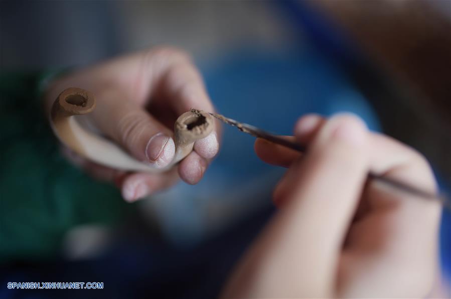 La cer&aacute;mica vidridada verde fue reconocida como parte del patrimonio cultural de Sichuan en 2009.