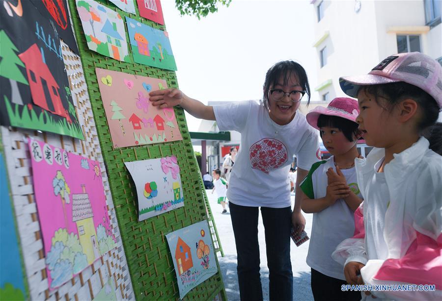 CHINA-ZHEJIANG-NIÑOS-PAPEL CORTADO