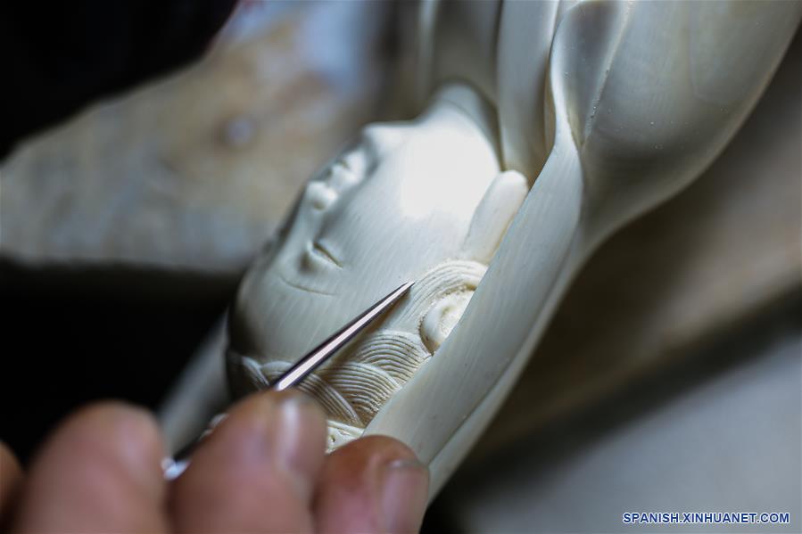 CHINA-BEIJING-TALLA DE DIENTES-HEREDERO