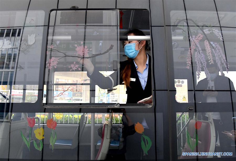 CHINA-HENAN-ZHENGZHOU-AUTOBUS-PINTURA-PRIMAVERA