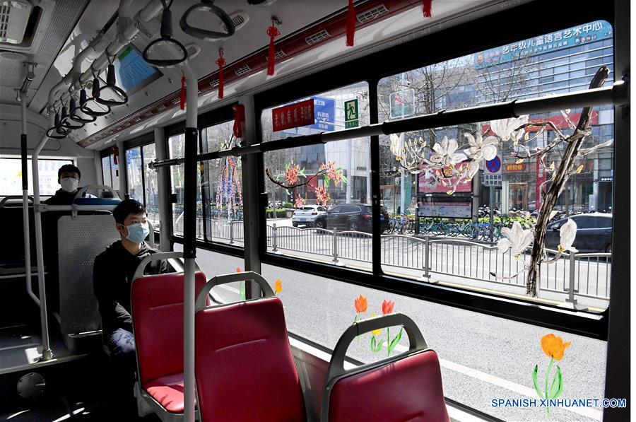 CHINA-HENAN-ZHENGZHOU-AUTOBUS-PINTURA-PRIMAVERA