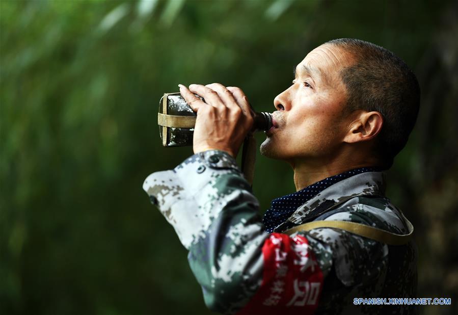 (4)CHINA-CHONGQING-BOSQUE-PROTECCION-GUARDABOSQUES
