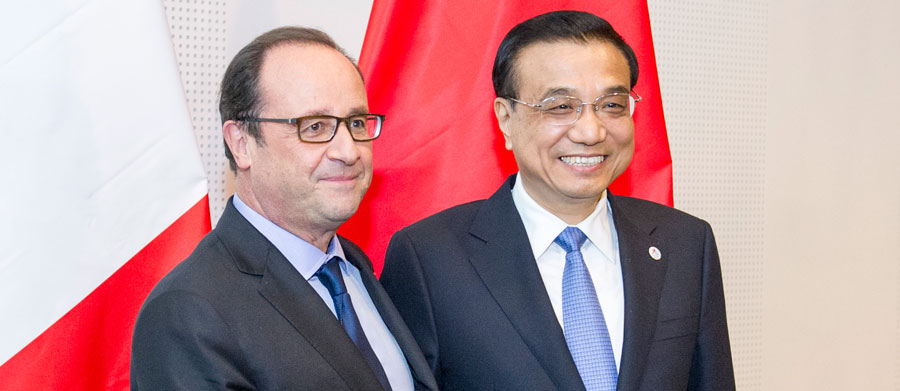 PM chino y presidente francés discuten profundización de lazos