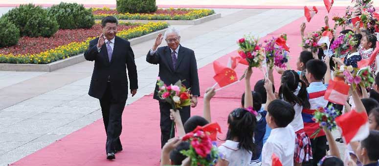 China y Singapur prometen impulsar sus relaciones