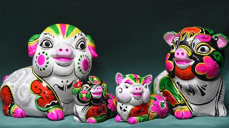 Esculturas de arcilla para saludar al Año del Cerdo