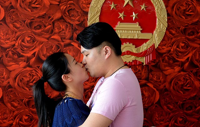 China: Las parejas escogieron casarse el 20 de mayo