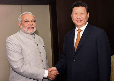 China y la India son socios en vez de rivales, afirma Xi