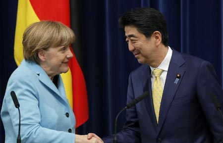 PM japonés y canciller alemana acuerdan acelerar TLC y luchar contra terrorismo