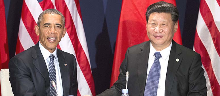 Xi y Obama se reúnen en París y prometen cooperar en lazos y cambio climático