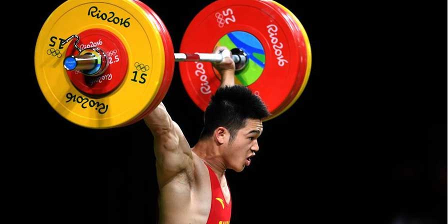 Shi Zhiyong gana tercero oro en halterofilia para China