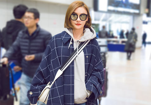 Nuevas fotos de actriz Yuan Shanshan en aeropuerto