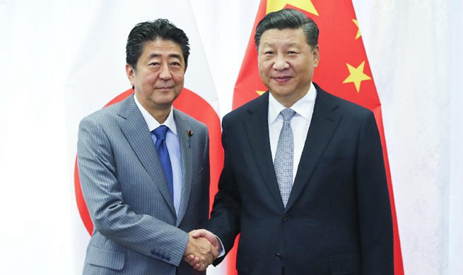 Xi y Abe se reúnen para mejorar aún más los vínculos entre China y Japón