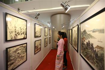 La exposición de arte titulada "Myanmar: A Través del Pincel del Dragón"