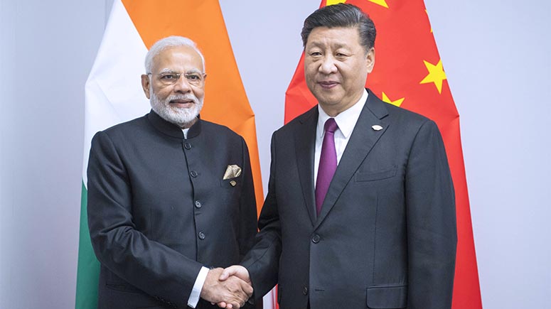 China y la India acuerdan llevar relaciones bilaterales a un nivel más alto