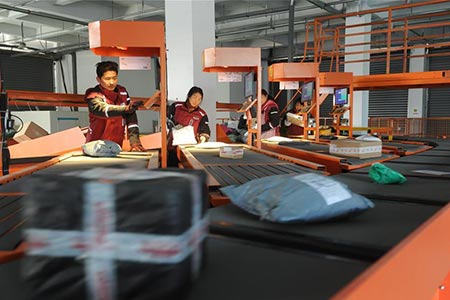 Festival de compras en línea "Doble 12" ha brindado mayores oportunidades de negocios a las empresas de logística de China