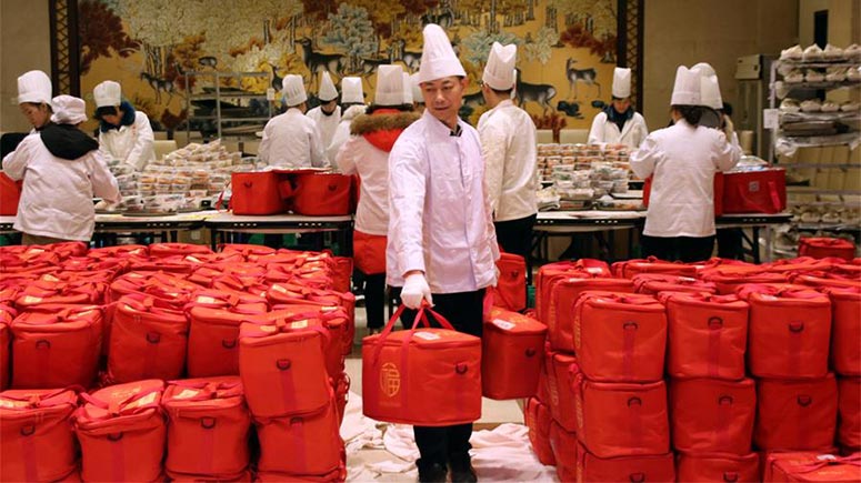 Restaurantes en Suzhou ofrecen comidas semi-terminadas empacadas para clientes