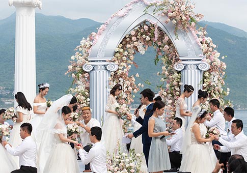 Hainan: Ceremonia de boda grupal en punto escénico de Isla Fenjiezhou