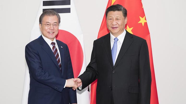 Xi y Moon acuerdan promover cooperación de ganar-ganar, multilateralismo y libre comercio